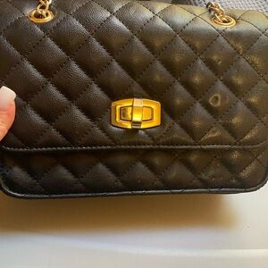 Express quilted crossbody bag